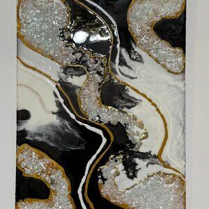 Eclipsed Elegance: A Resin Symphony of Black, White, and Gold